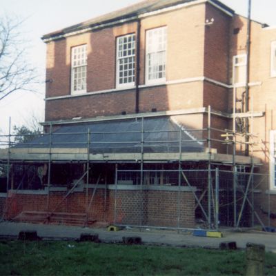 Curved lead roofing project on a large building by London Lead Roofing